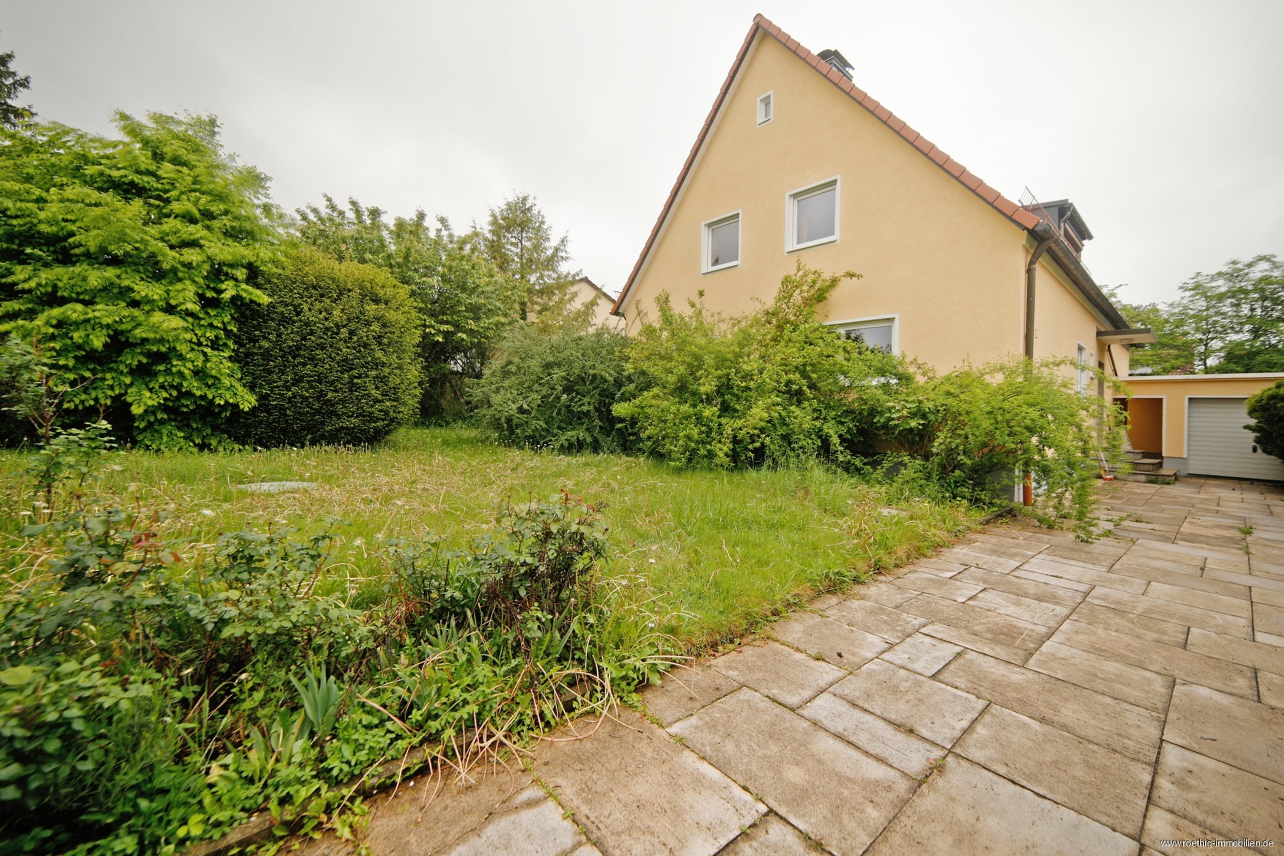 Pasing am Stadtpark freistehendes Haus auf großem